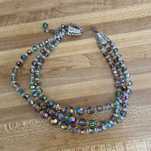 Dark sparkly necklace.